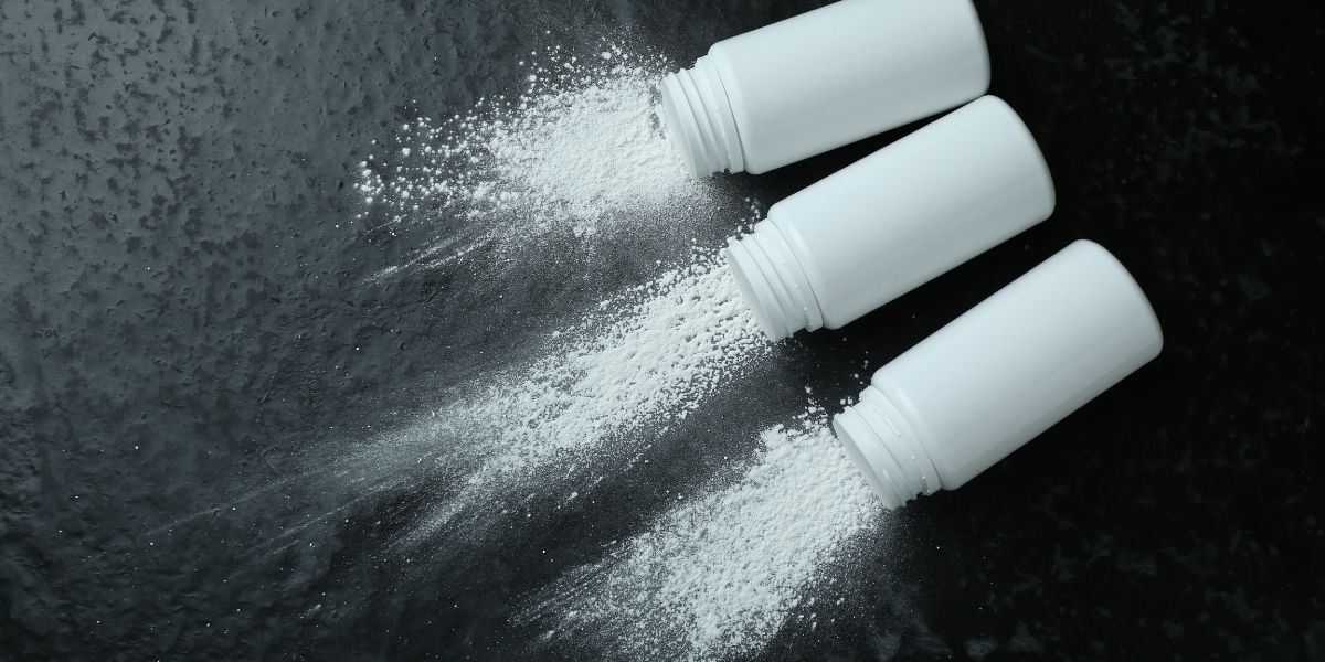 Talcum powder spilling from bottles - evidence of the products at the center of thousands of lawsuits